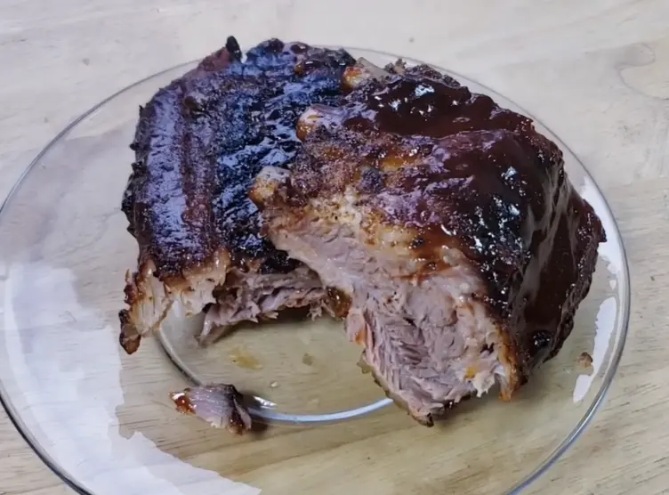 Half Slab fall-off-the-bone ribs with BBQ sauce