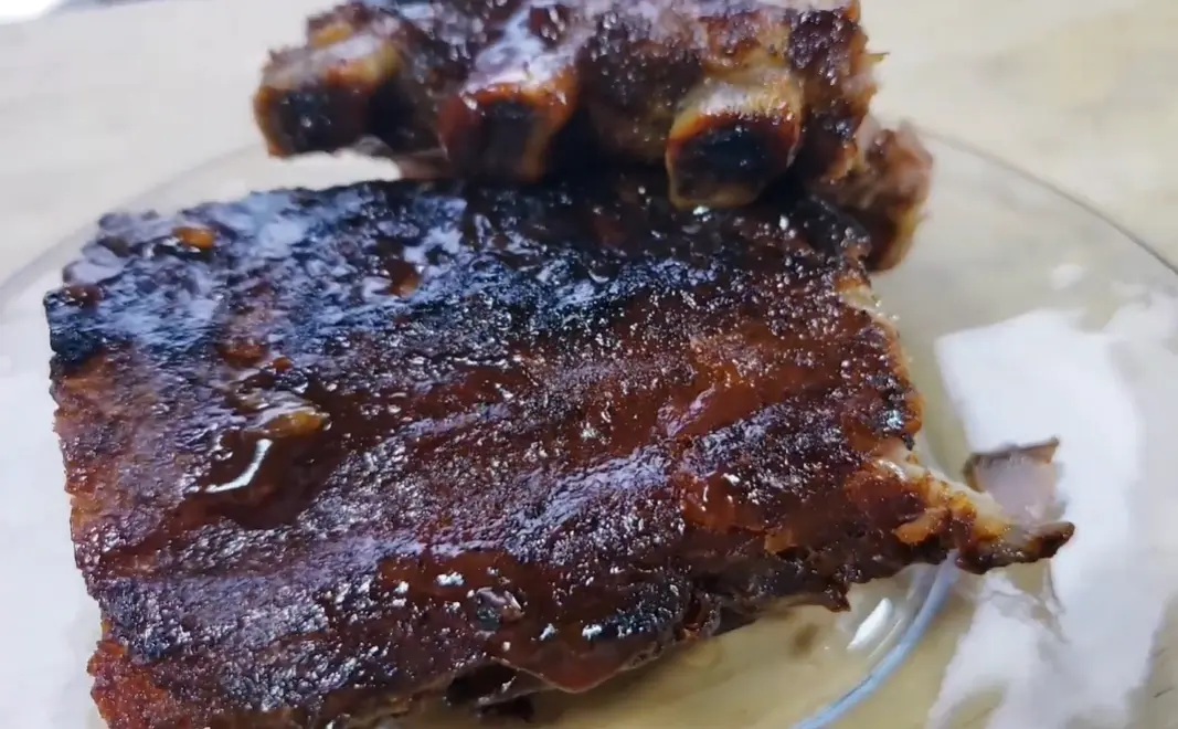 Full Slab fall-off-the-bone ribs with signature BBQ sauce
