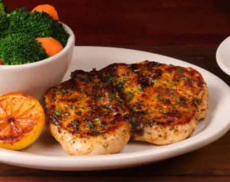 Herb Crusted Chicken flame-grilled with caramelized lemon
