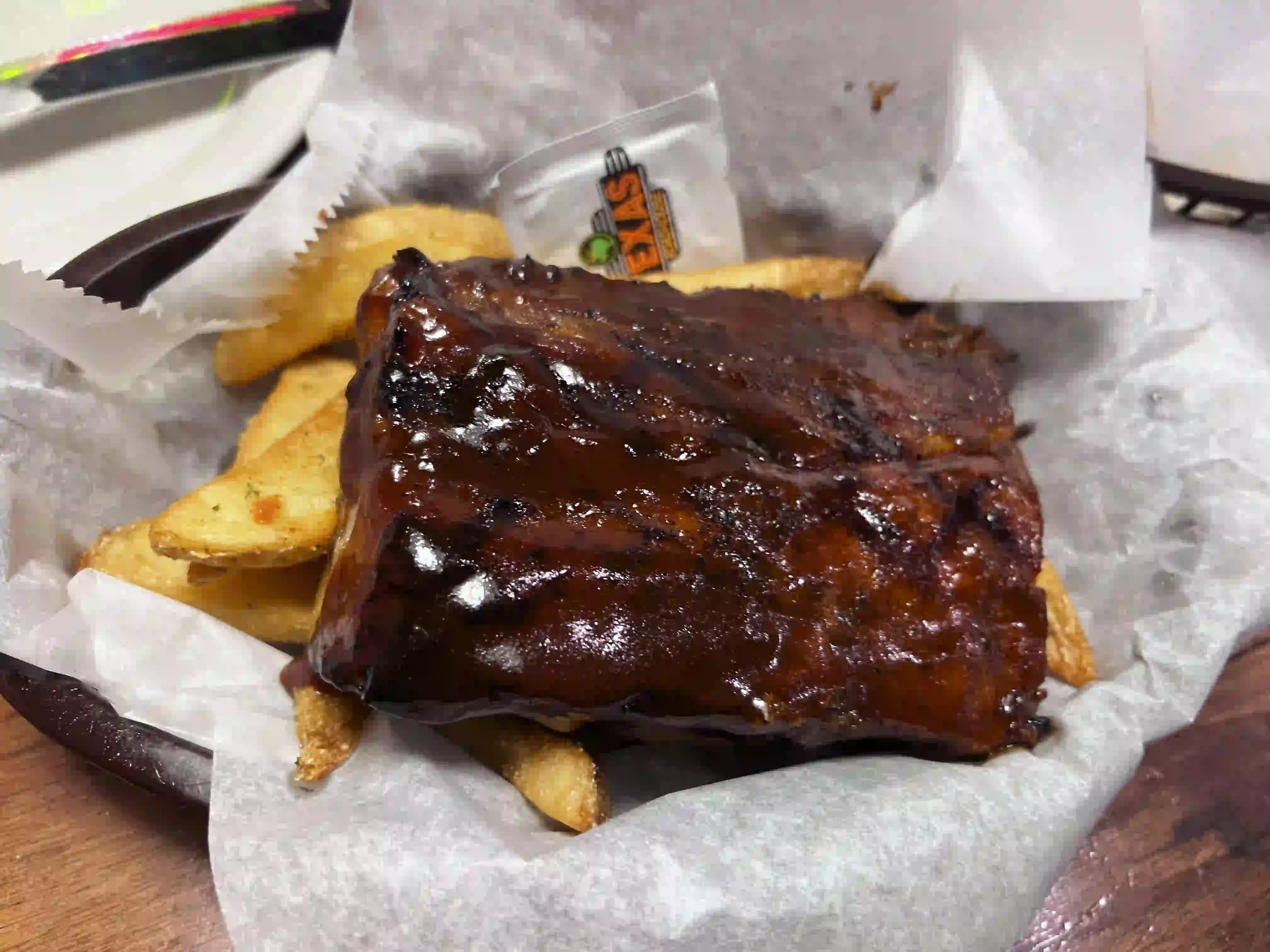 Award-winning BBQ ribs with golden steak fries