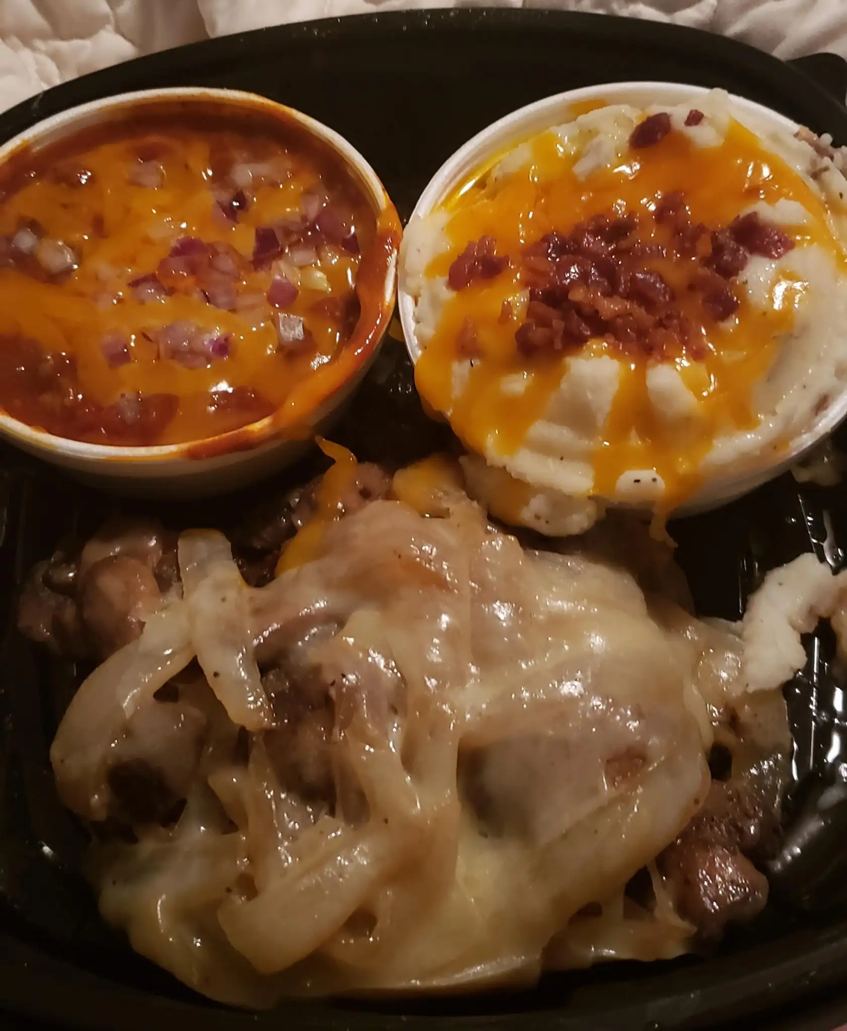 Road Kill chopped steak smothered with toppings