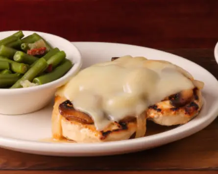 Smothered Chicken with mushrooms, onions and jack cheese